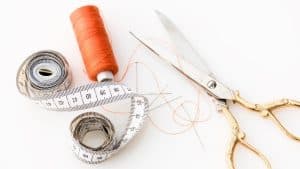 can you sew through fabric glue